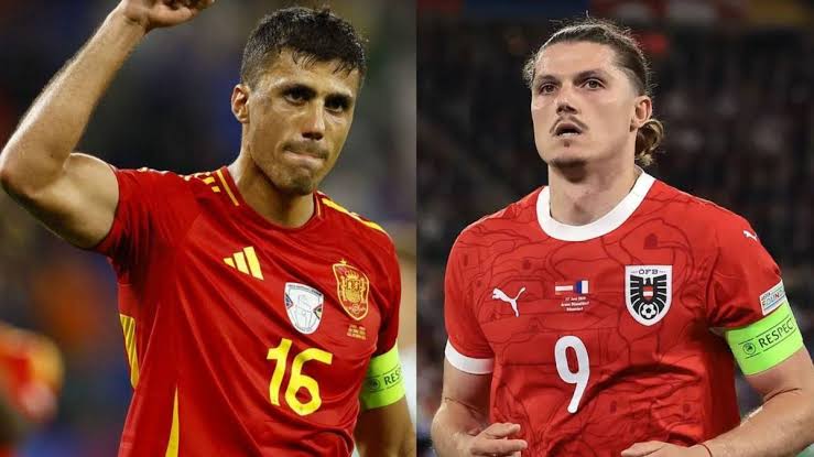 Spain and Austria captains in a matchday spotlight image