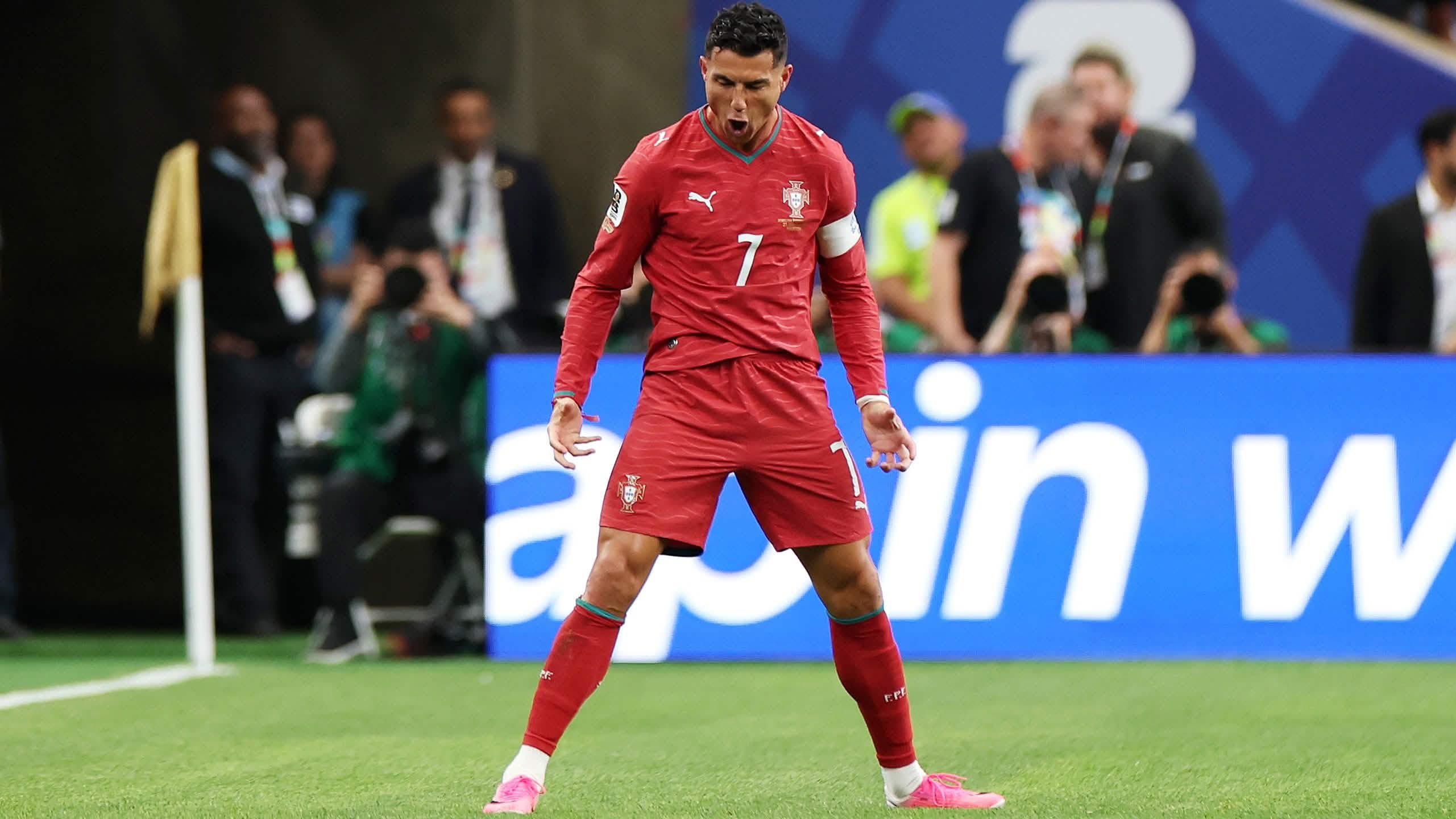 Cristiano Ronaldo in Portugal red celebrating on the pitch